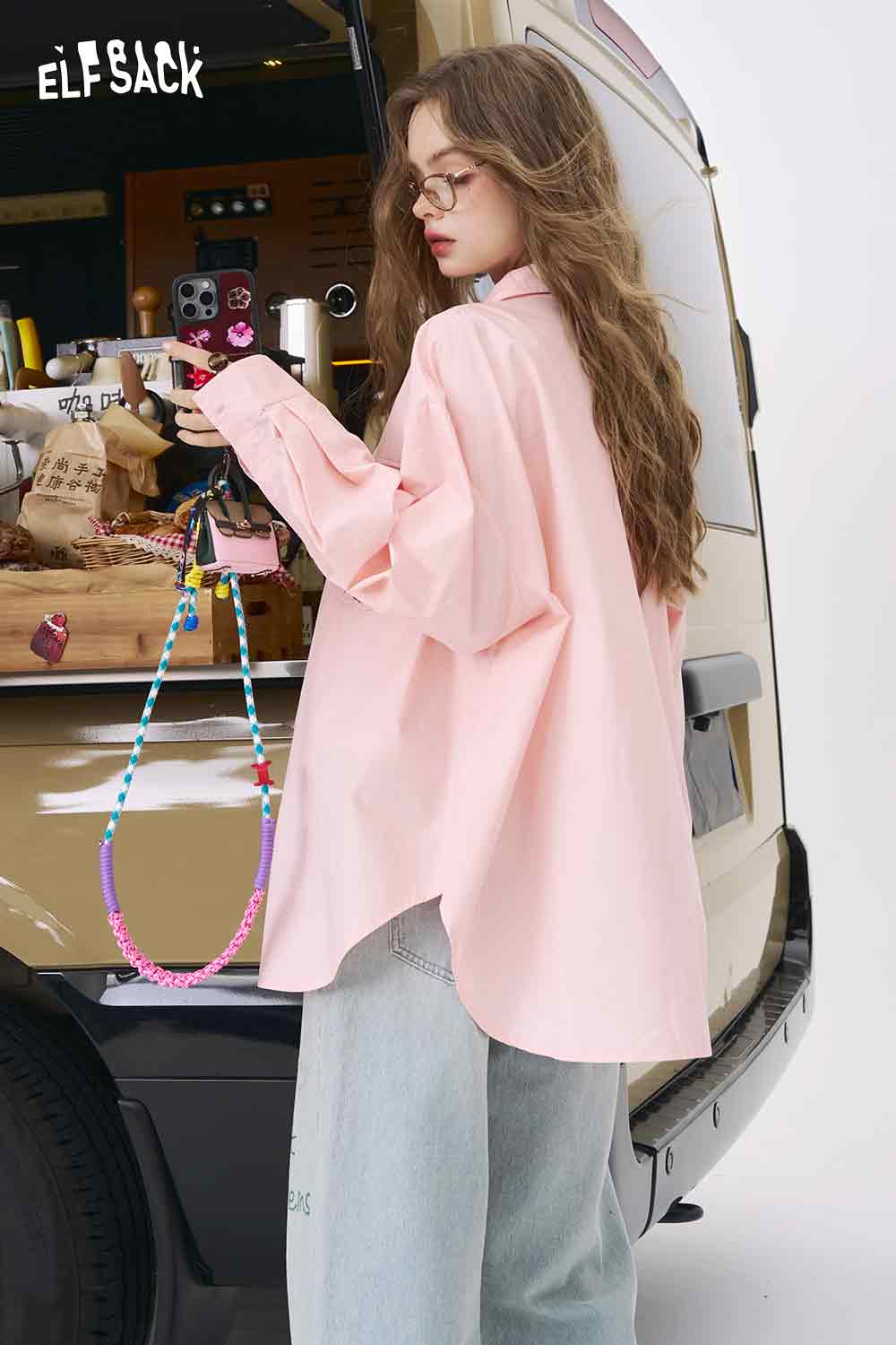 ELFSACK womens oversized pink shirt back view with rounded hem and loose sleeves paired with jeans 3D handmade crocheted shirt