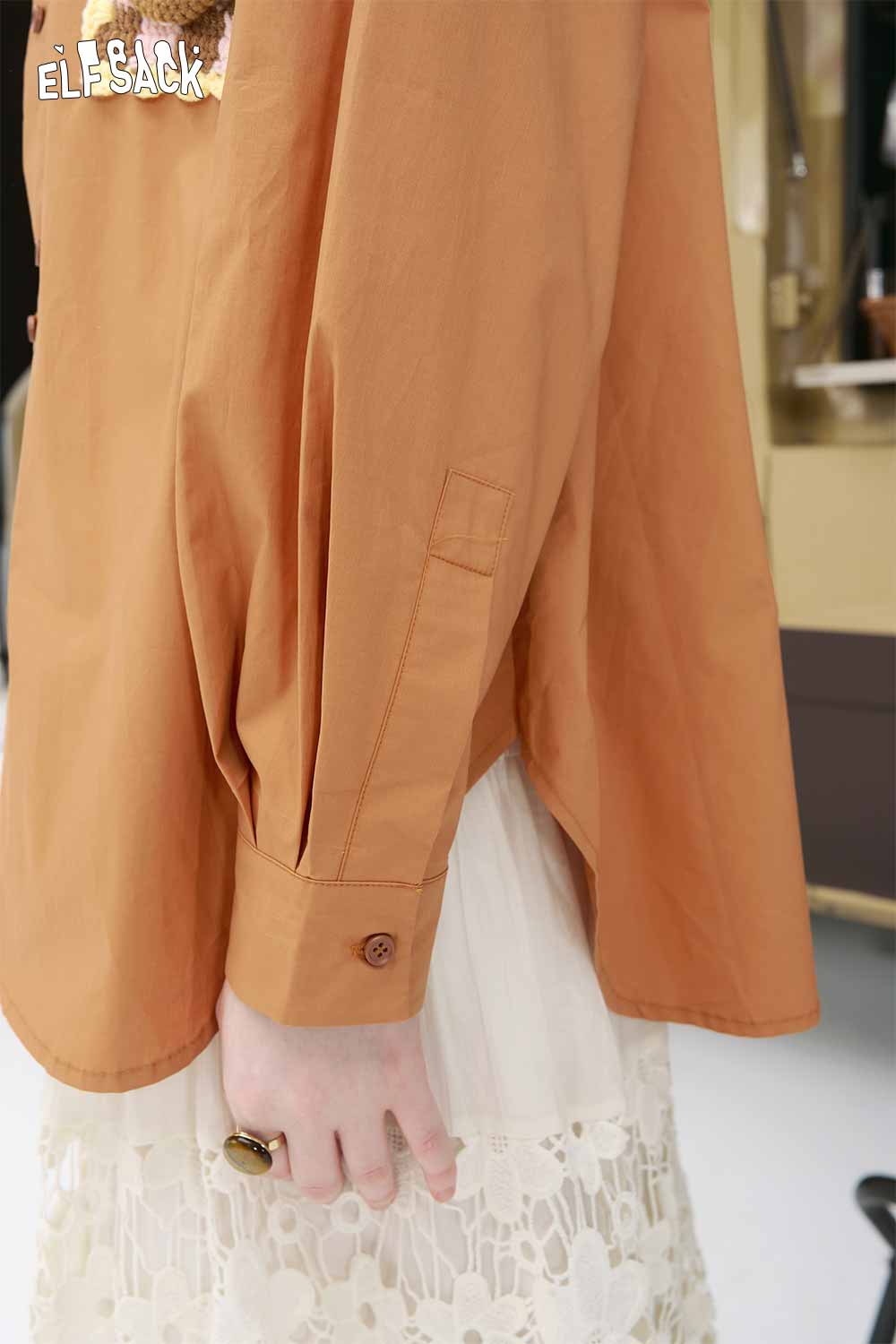 ELFSACK women rust orange blouse close up sleeve and cuff paired with lace skirt 3D handmade crocheted shirt