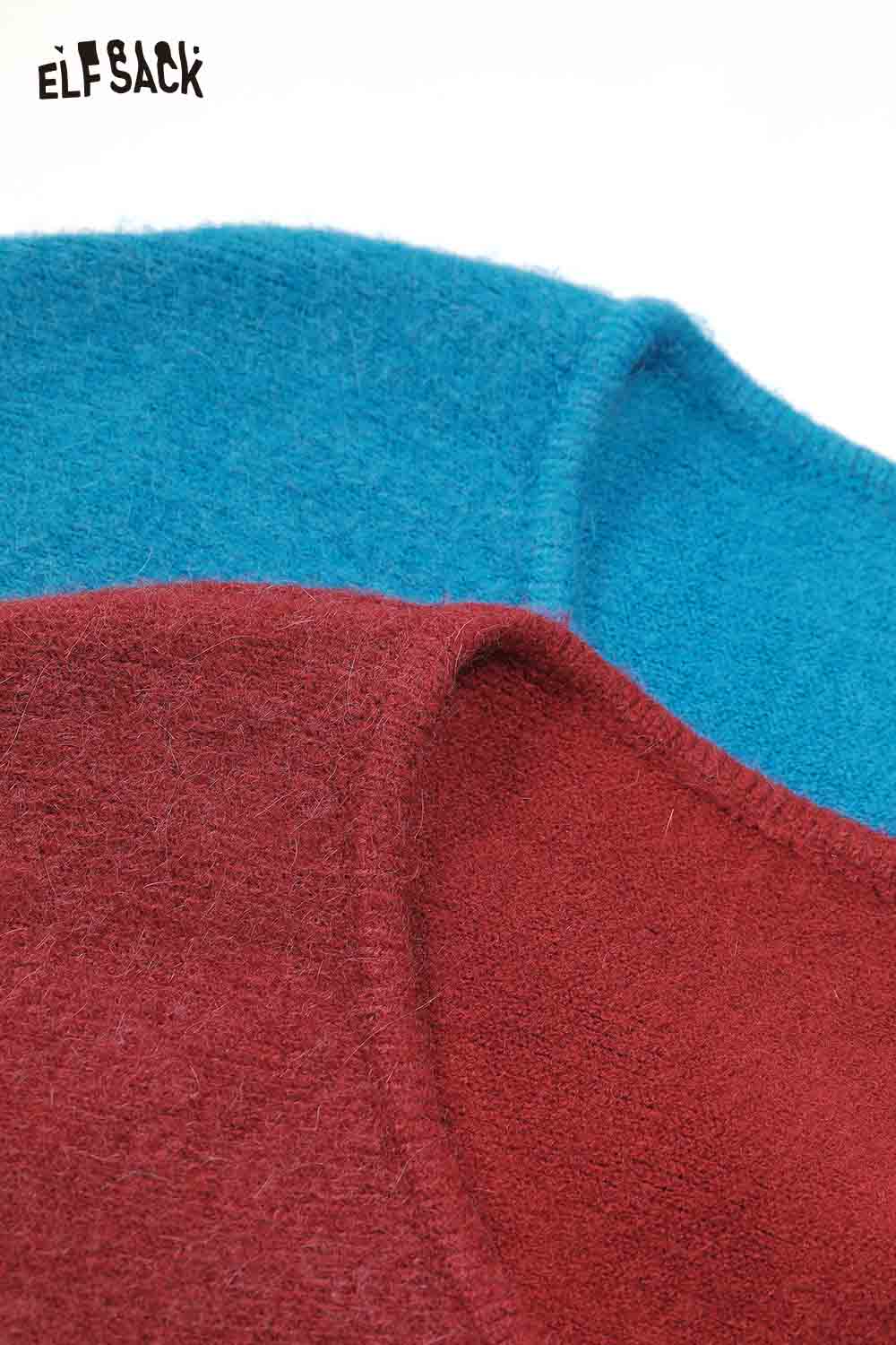 Close-up of ELFSACK bat sleeve polka dot sweater in blue and maroon with soft texture