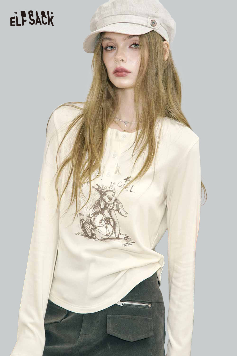 ELFSACK bear graphic relaxed fit tee in cream color with long sleeves and stylish design