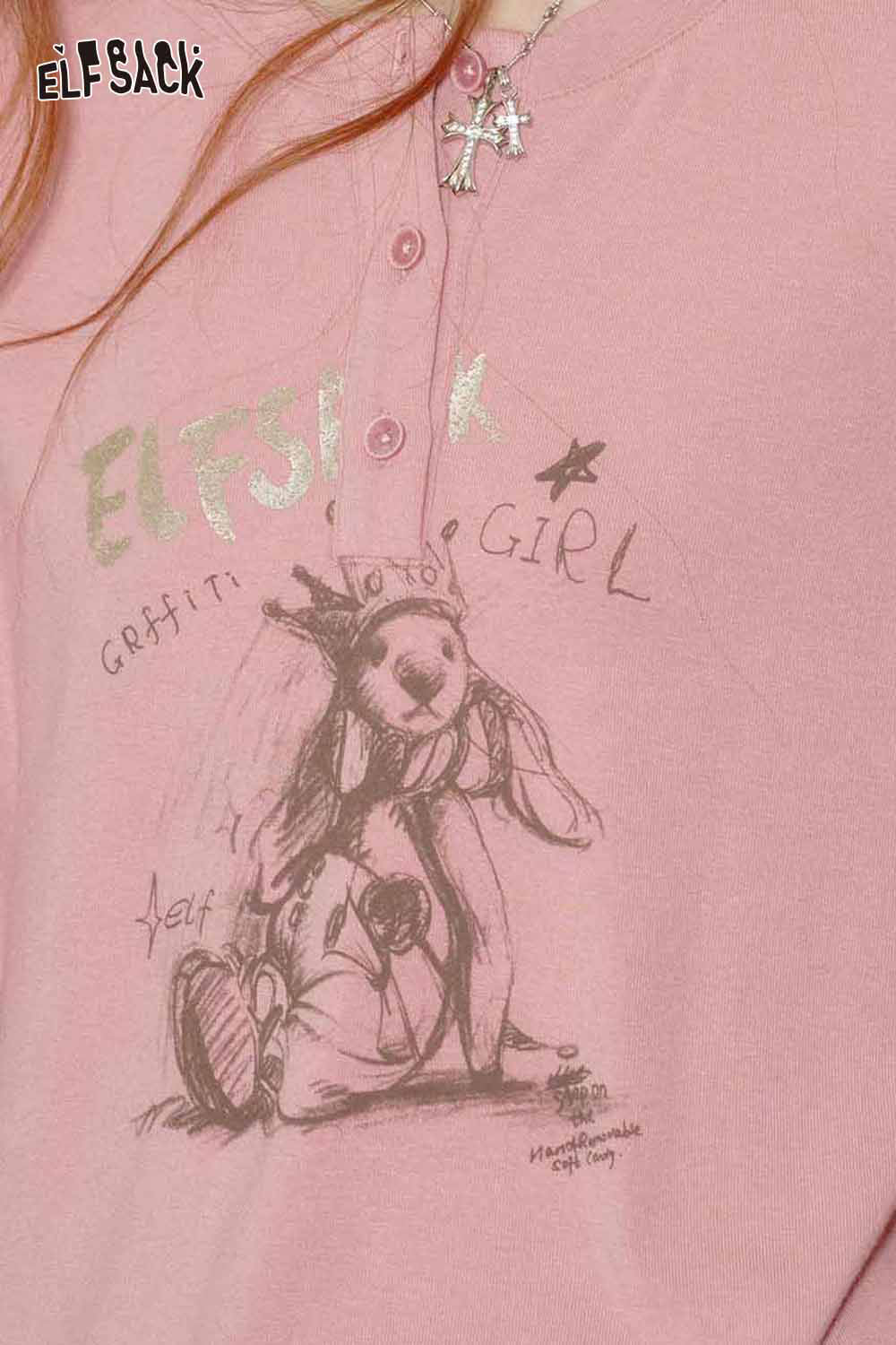 Pink ELFSACK bear graphic relaxed fit tee featuring playful artwork and soft fabric for casual wear