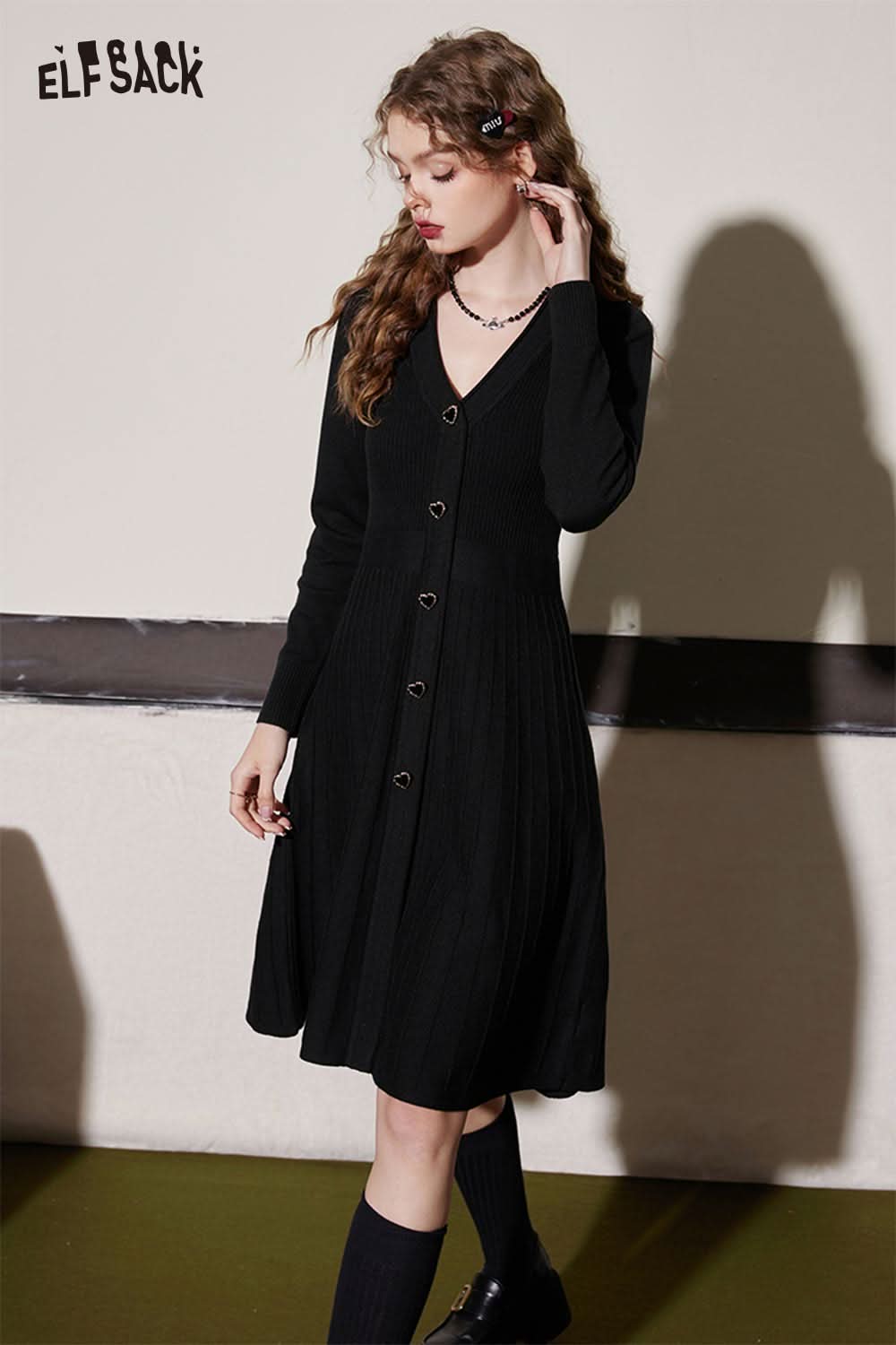 ELFSACK black knit sheath dress with a v-neck and button detailing for a chic look