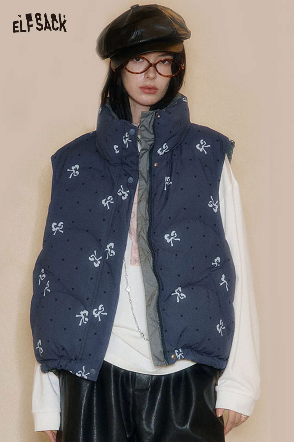 ELFSACK Bohemian floral reversible vest in blue with unique bow pattern for stylish layering