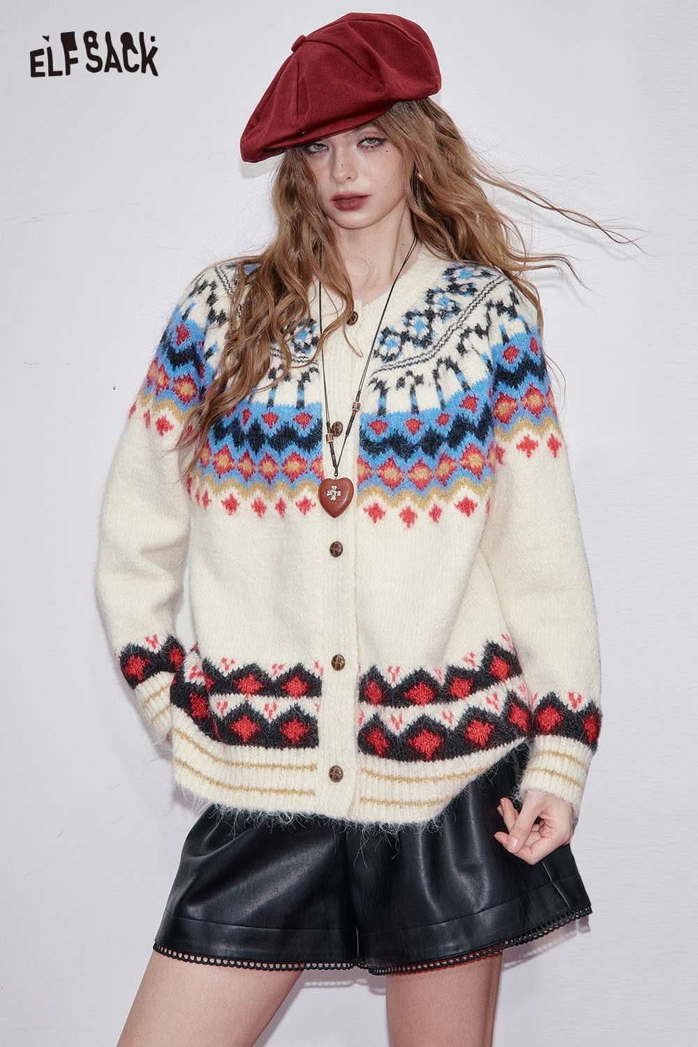 ELFSACK bohemian knit cardigan for women in cream with colorful patterns, paired with a black skirt and red beret