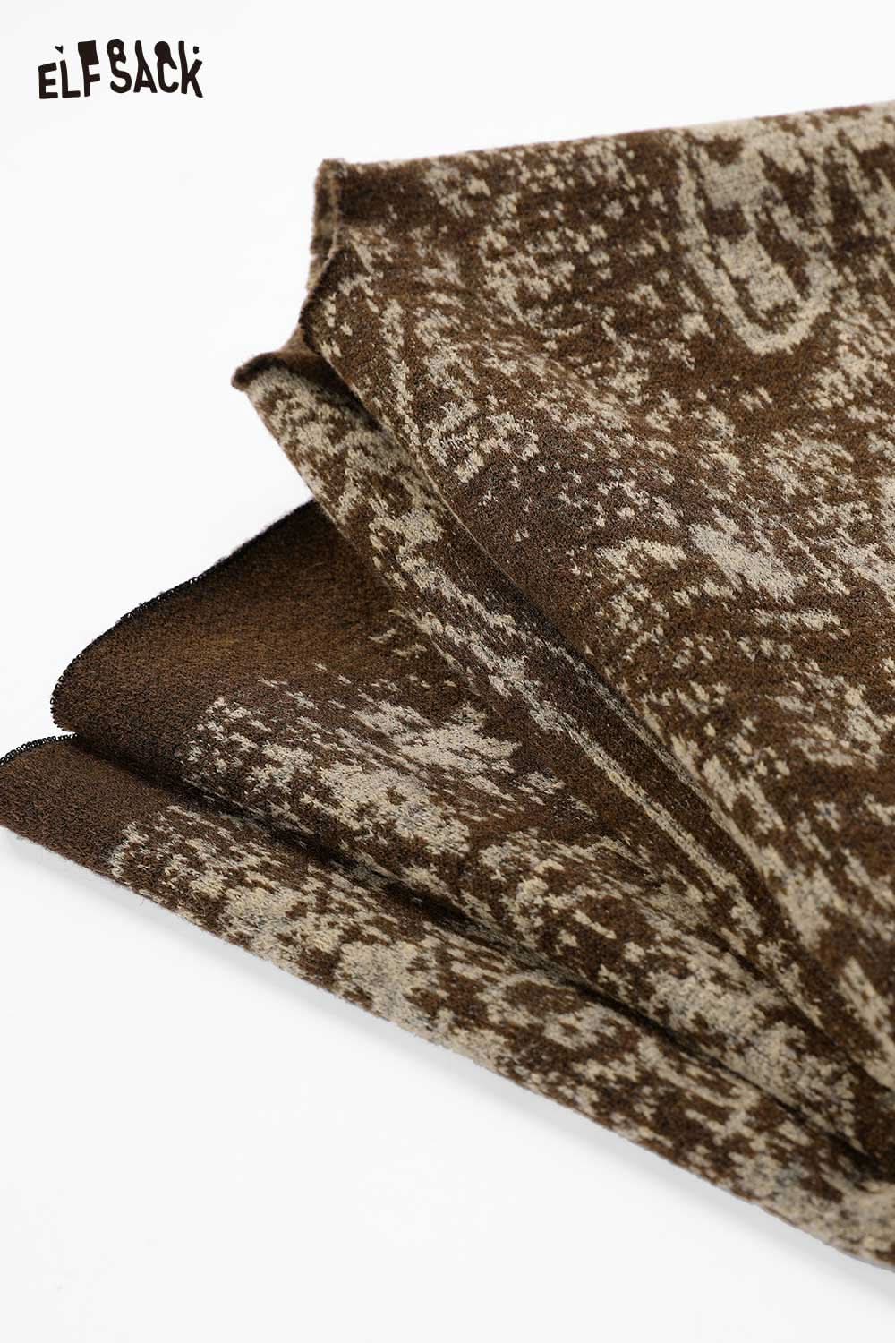 ELFSACK Bohemian knit shawl with fringe in earthy tones, perfect for layering and adding style