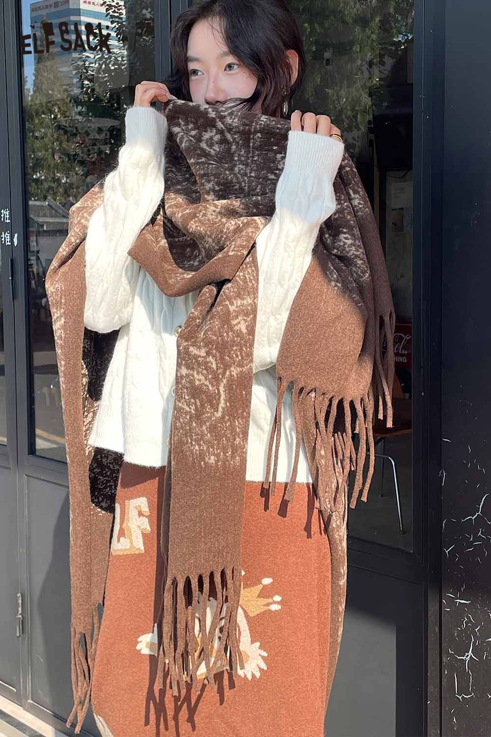 ELFSACK bohemian knit shawl with fringe in warm brown tones, perfect for cozy layering