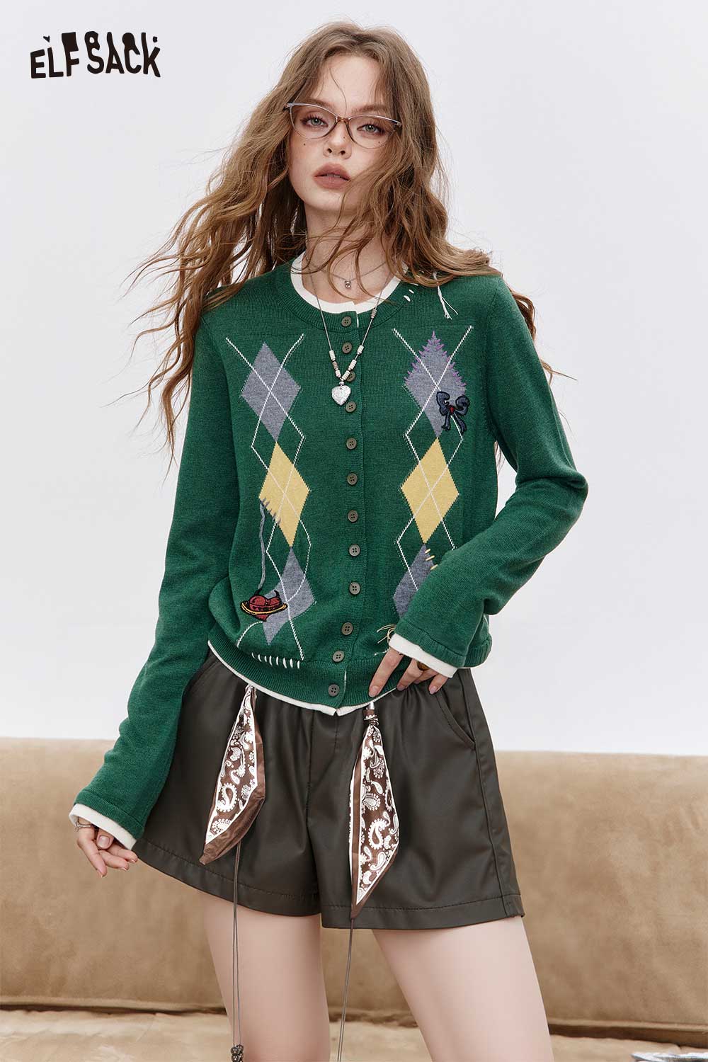 ELFSACK bohemian paisley print shorts paired with a green argyle cardigan for a stylish look
