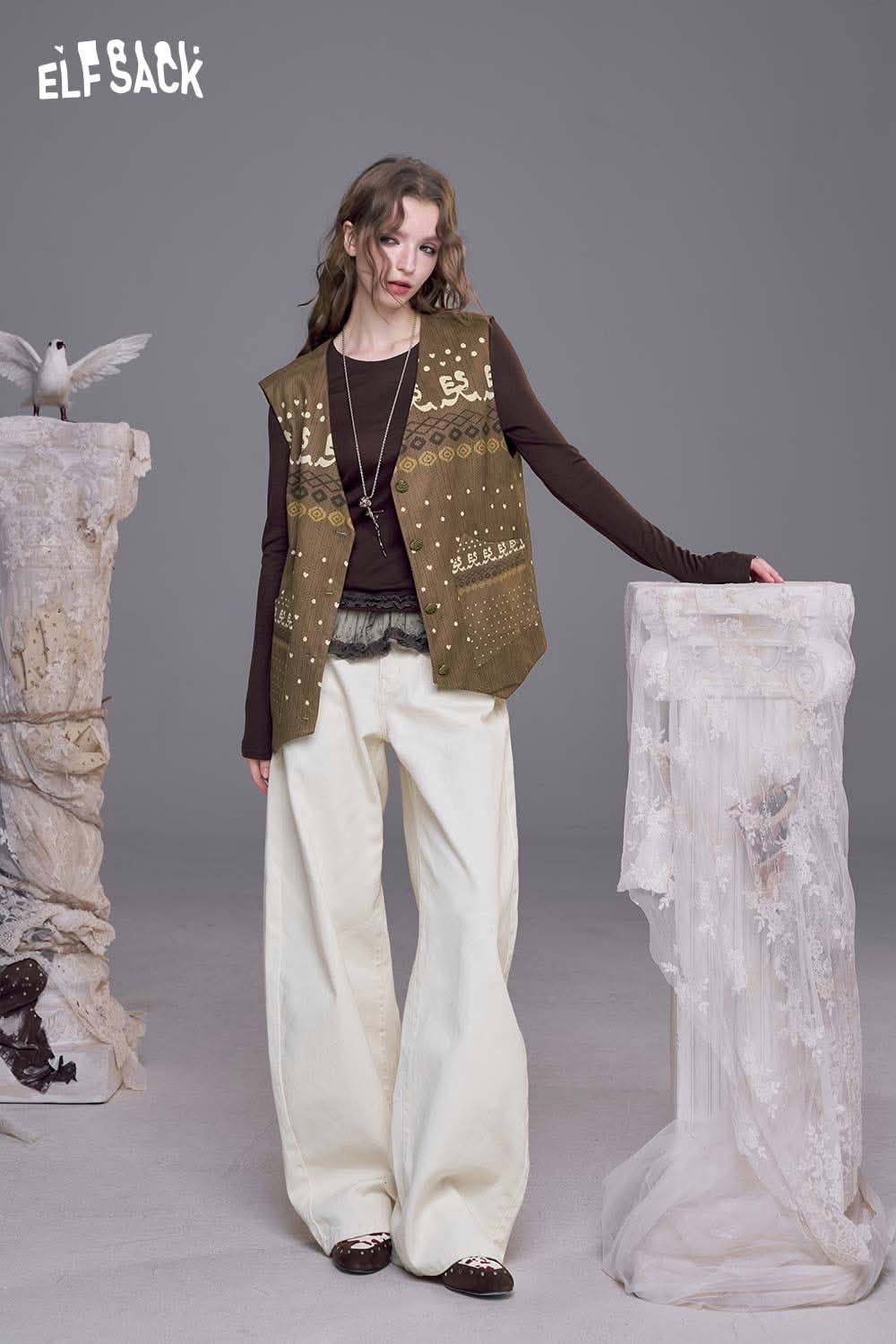 ELFSACK bohemian suede vest for women in earthy tones styled with wide-leg pants