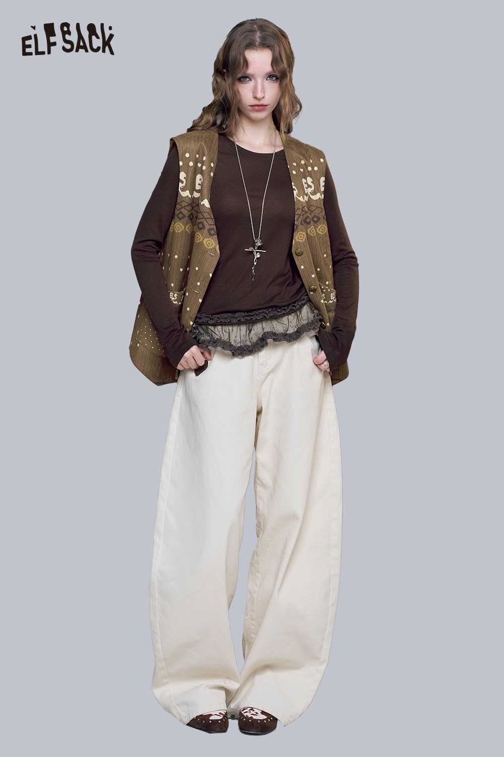 ELFSACK bohemian suede vest for women styled with a brown top and wide-legged pants