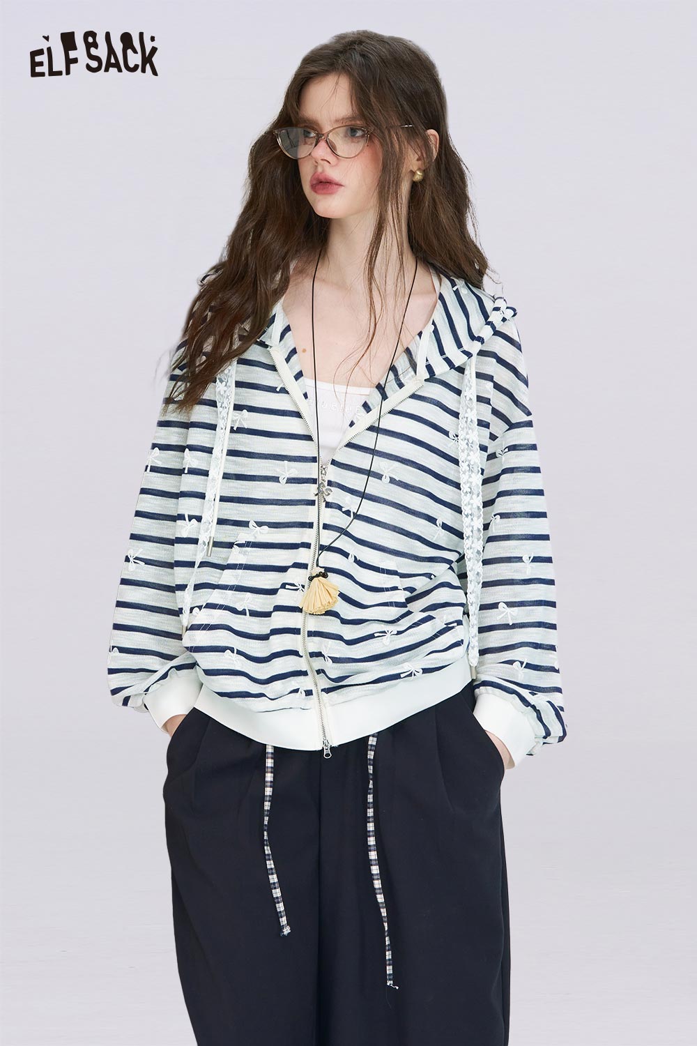ELFSACK model wearing oversized striped cardigan for women navy and white hooded zip knit with relaxed fit