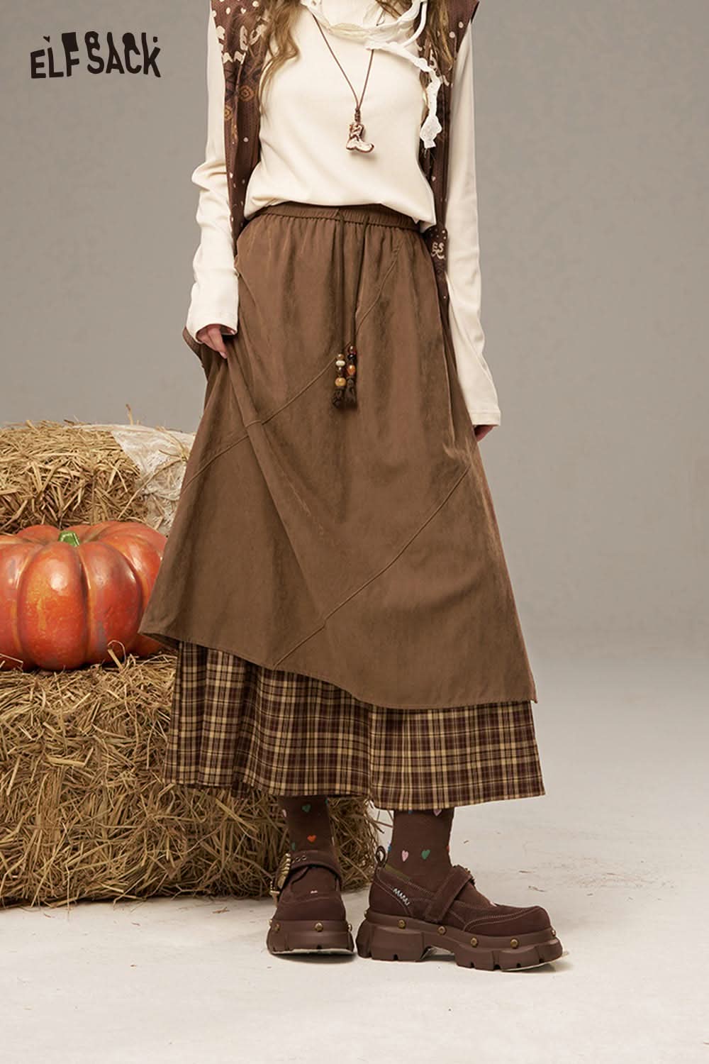 ELFSACK breathable lace patchwork skirt in brown with a layered design and decorative ties