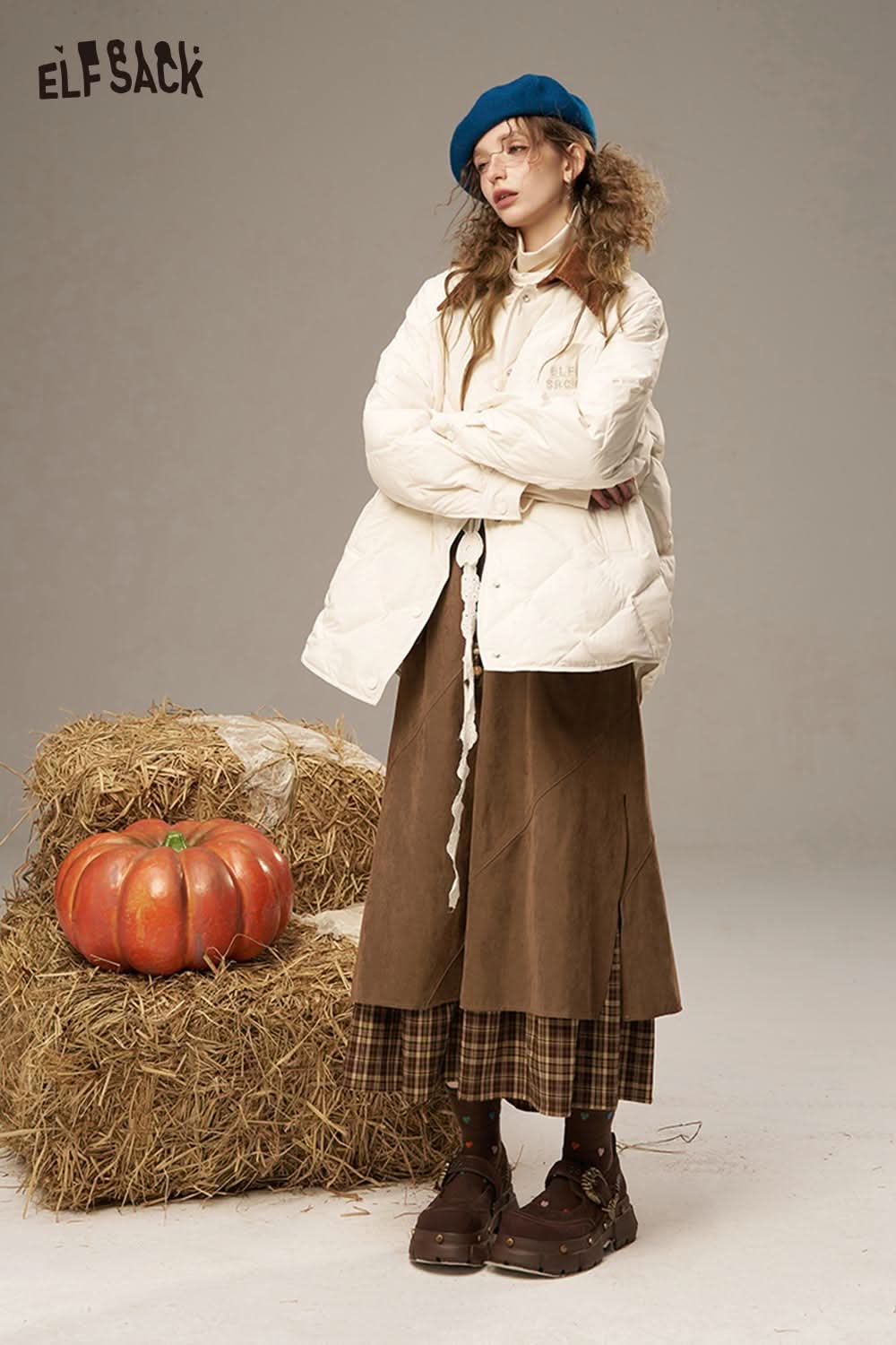 ELFSACK breathable lace patchwork skirt styled with a cozy quilted jacket and beret