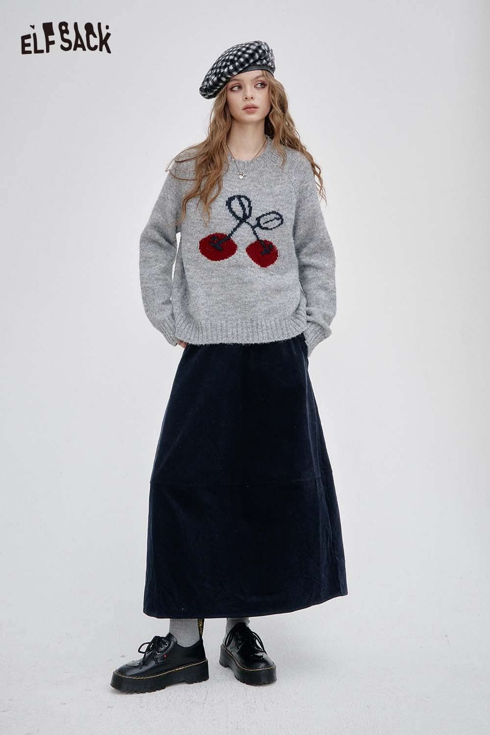 Breathable midi skirt for women by ELFSACK paired with a cozy sweater and stylish accessories