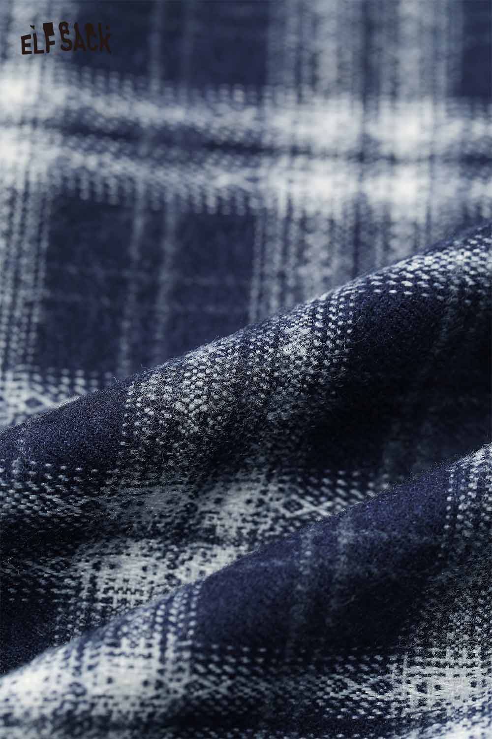 Close-up of breathable plaid a-line skirt set fabric showcasing soft texture and classic pattern