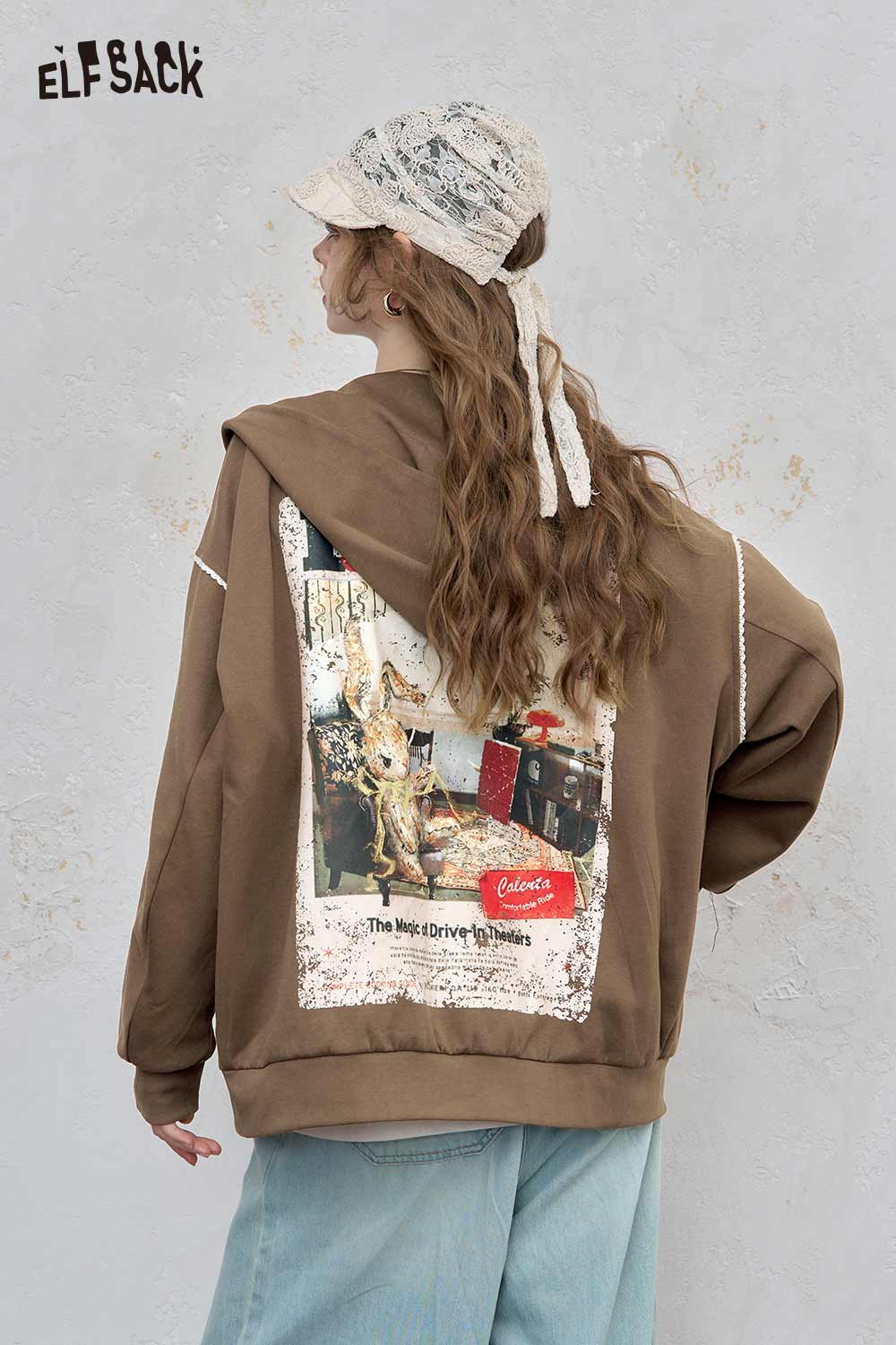 ELFSACK brushed French terry zip up hoodie in brown with graphic patch and relaxed fit for casual style