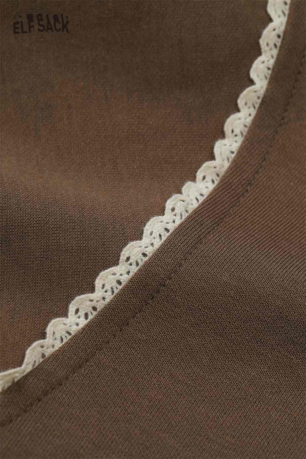 Close-up of the collar detail on ELFSACK brushed French terry zip up hoodie in soft brown fabric