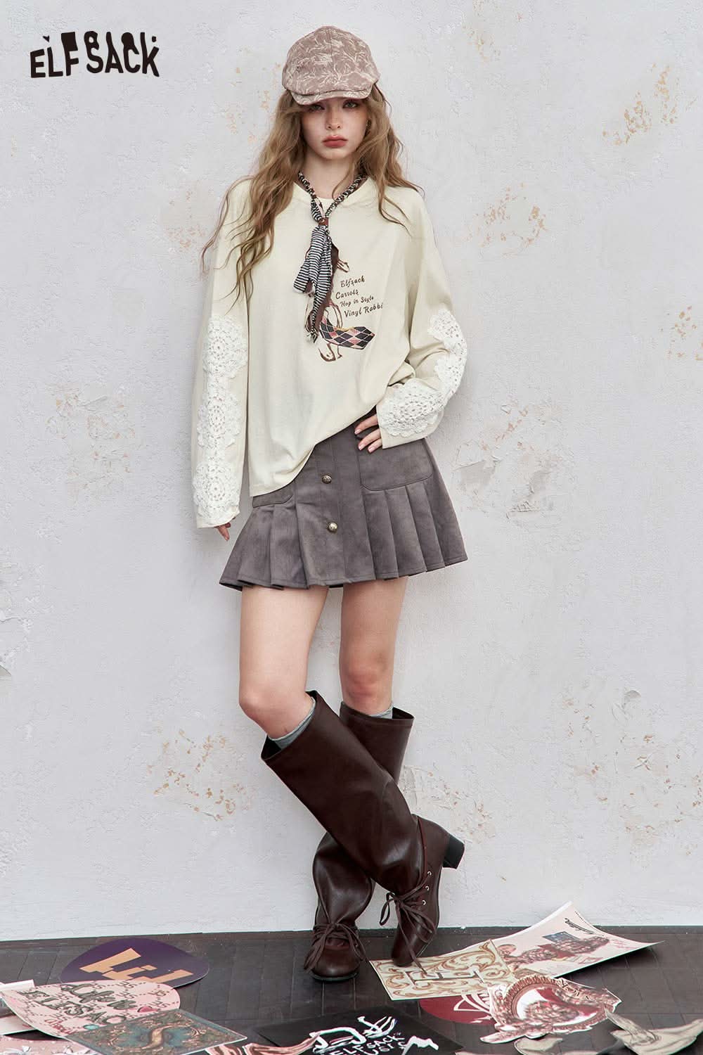 ELFSACK bunny graphic tee for women with long sleeves and stylish outfit featuring a gray skirt and knee-high boots