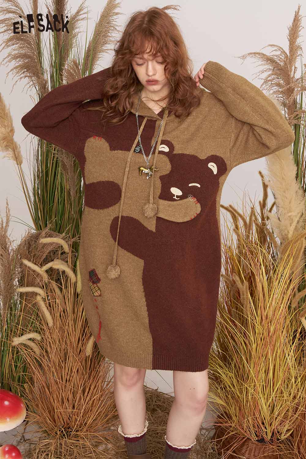 ELFSACK cartoon bear sweater dress in brown featuring a playful bear design and cozy fit