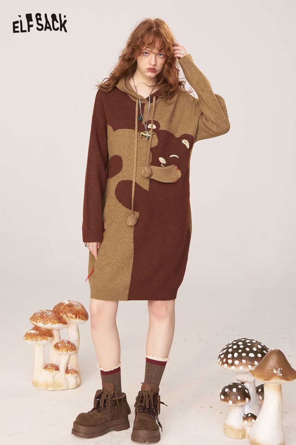 ELFSACK cartoon bear sweater dress in brown and tan with a cozy hood and playful bear design
