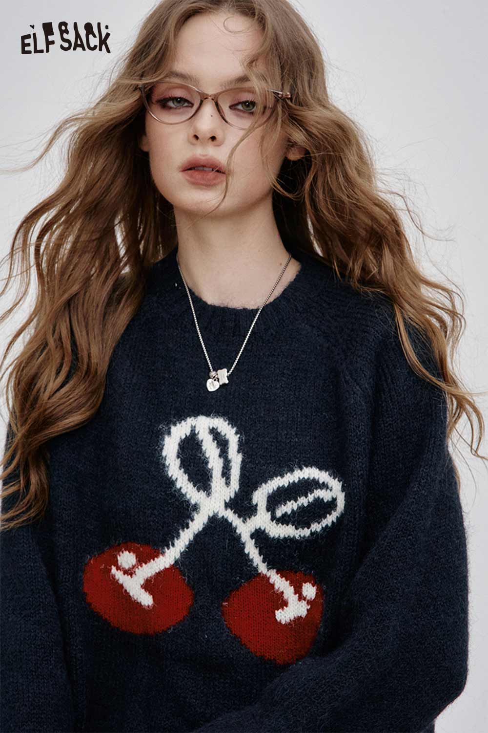 ELFSACK cartoon cherry print sweater featuring a playful cherry design on a cozy knit fabric
