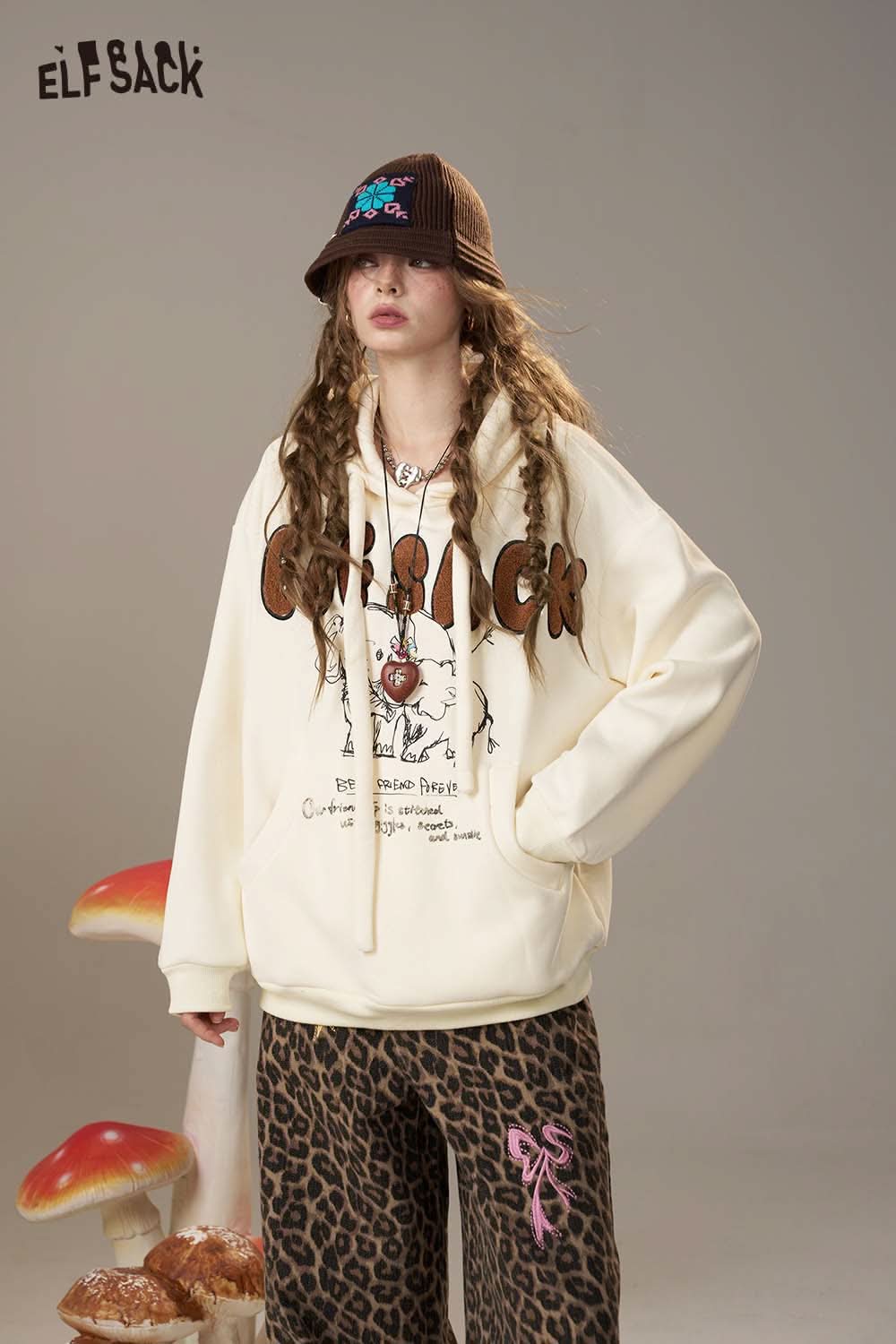 ELFSACK cream cartoon elephant hooded sweatshirt featuring fun graphics and a cozy fit