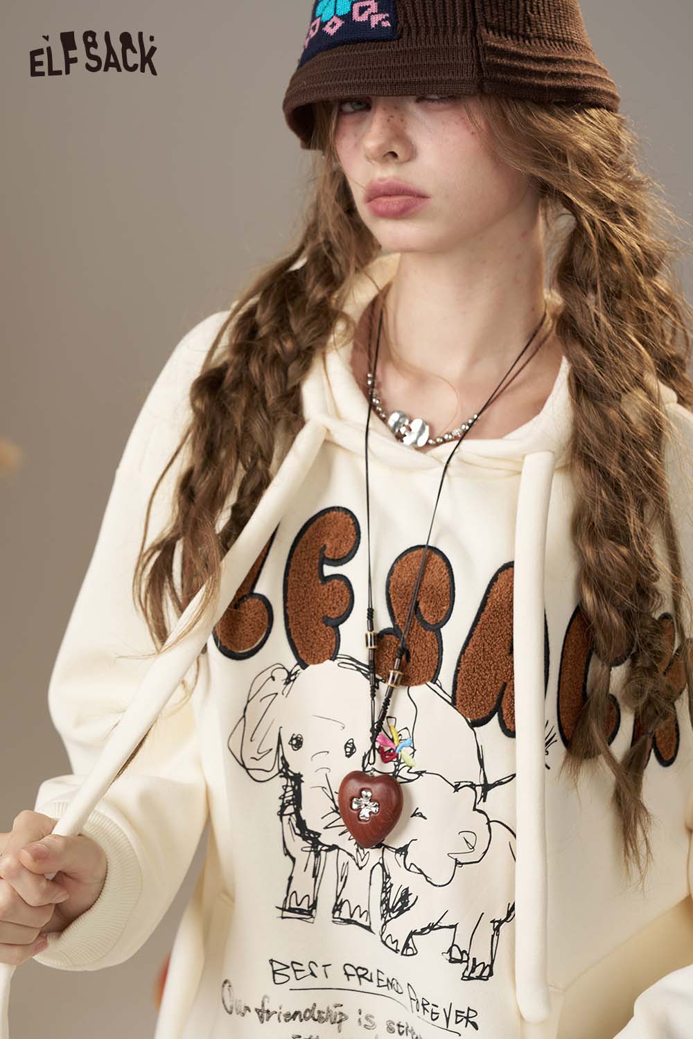 ELFSACK cartoon elephant hooded sweatshirt with playful print and cozy design for casual wear