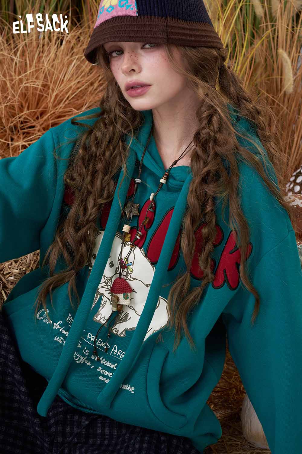 ELFSACK cartoon elephant hooded sweatshirt in teal with playful graphics and a relaxed fit