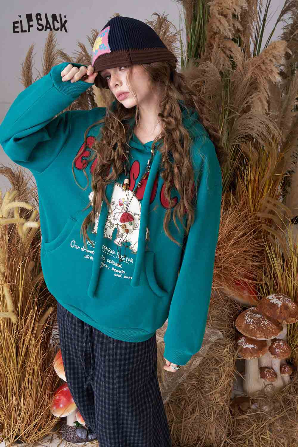 ELFSACK cartoon elephant hooded sweatshirt in teal with playful design and adjustable drawstring