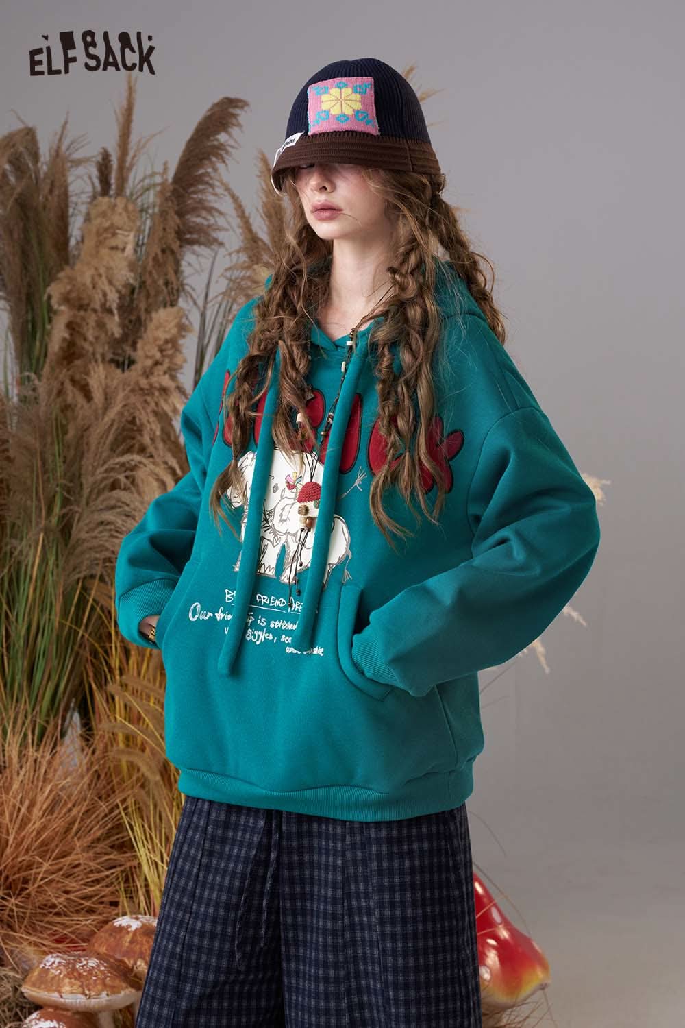 ELFSACK cartoon elephant hooded sweatshirt in teal with cute illustrations and relaxed fit
