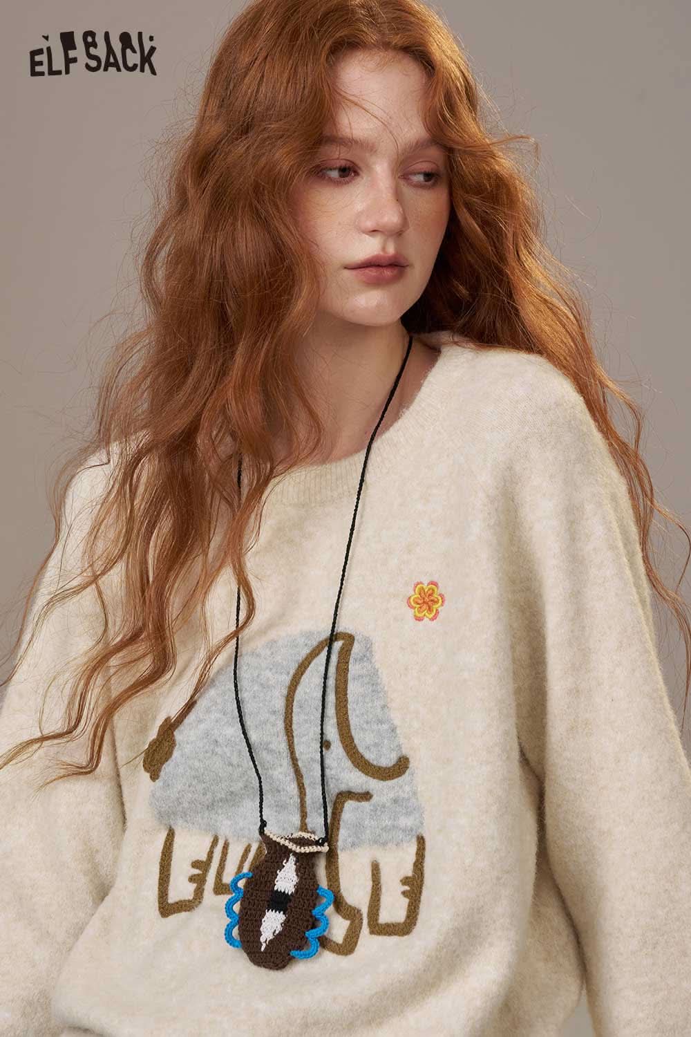 ELFSACK cartoon embroidery sweater featuring a cute elephant design on a cozy cream knit fabric