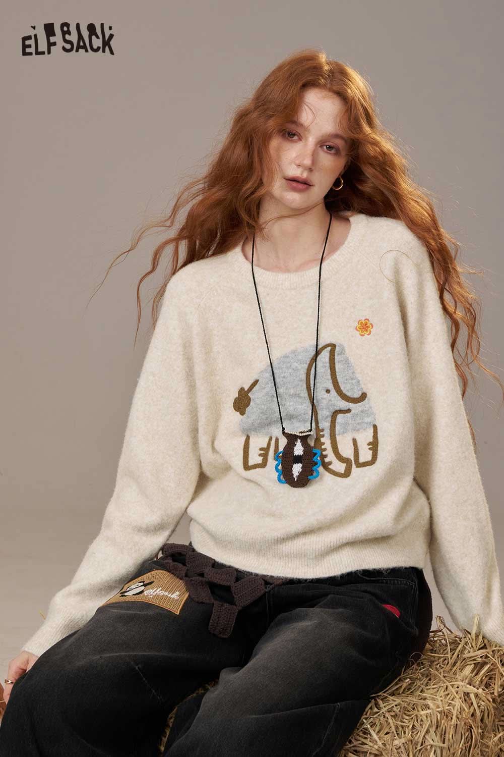 ELFSACK cartoon embroidery sweater features a playful design with a cozy fit for casual wear