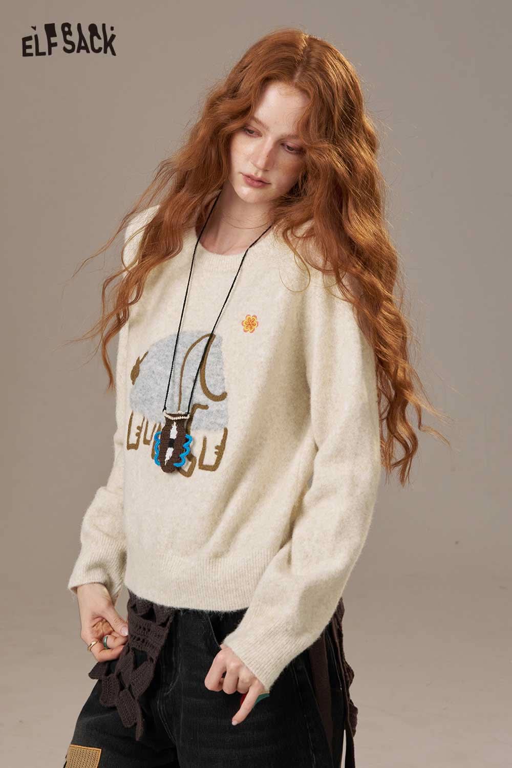 ELFSACK cream cartoon embroidery sweater featuring playful designs, perfect for casual outfits