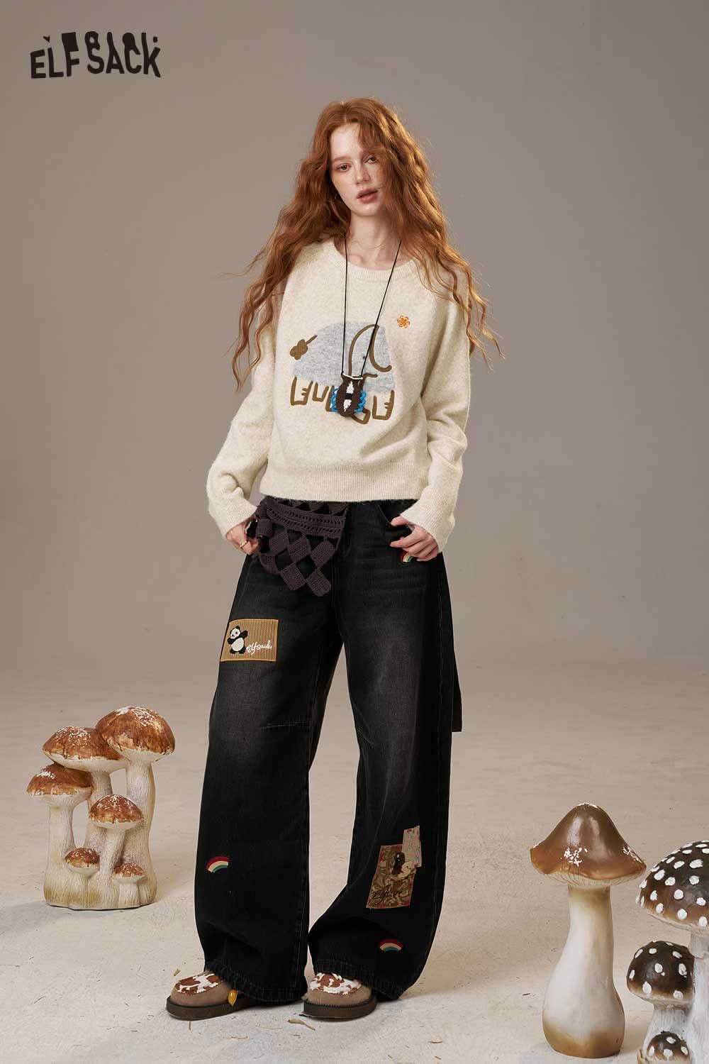 ELFSACK cartoon embroidery sweater featuring a playful design, paired with relaxed black jeans