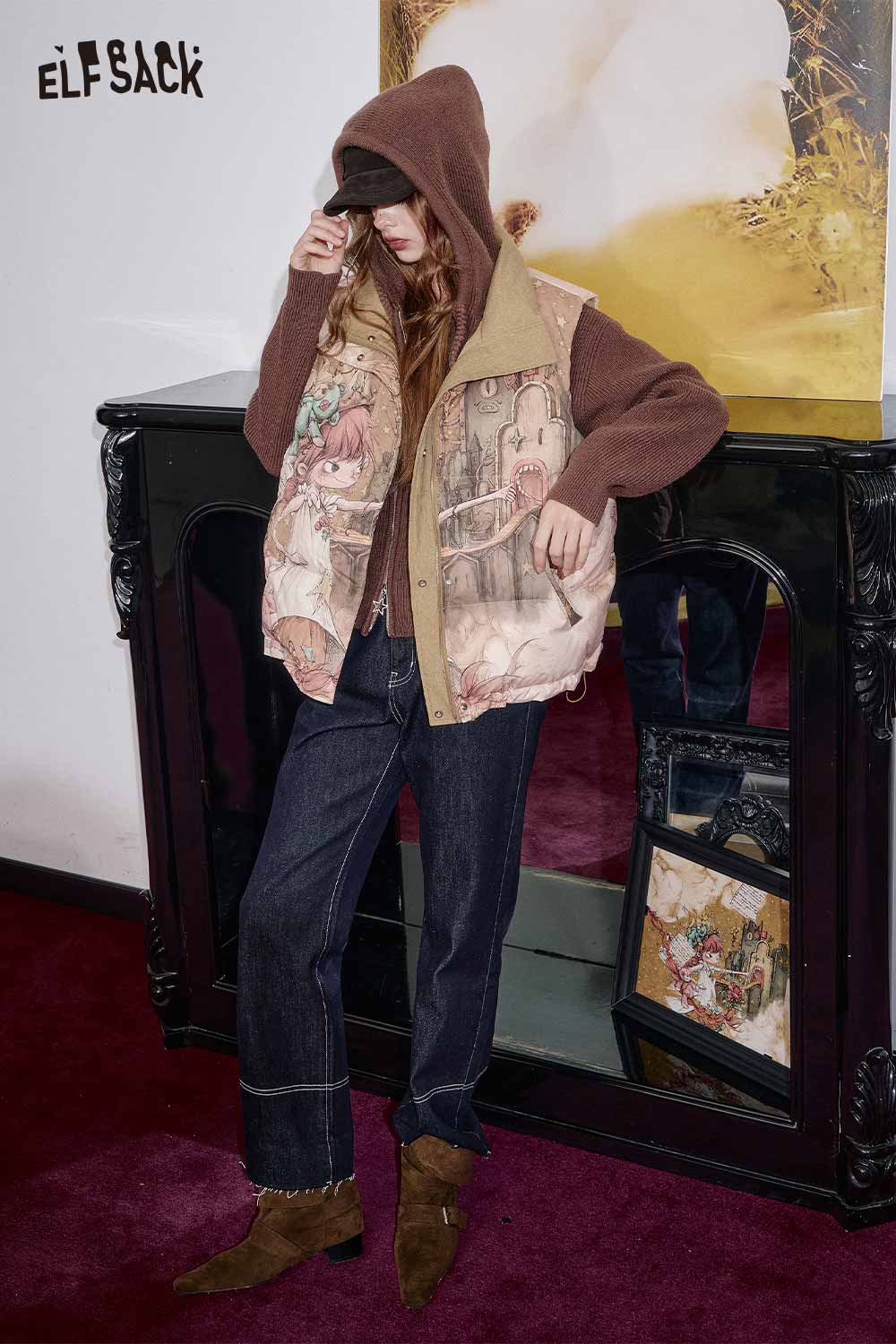 ELFSACK cartoon graphic puffer vest featuring artistic designs and cozy layering for stylish winter outfits