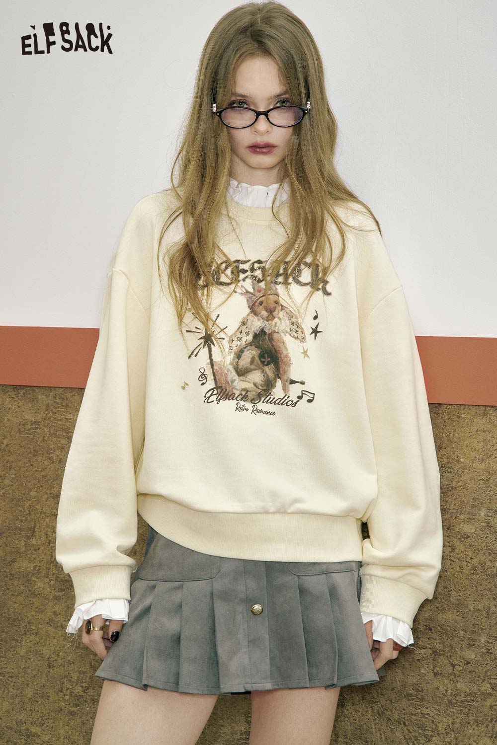 ELFSACK cartoon graphic ruffle sweatshirt featuring stylish design with ruffled collar and relaxed fit