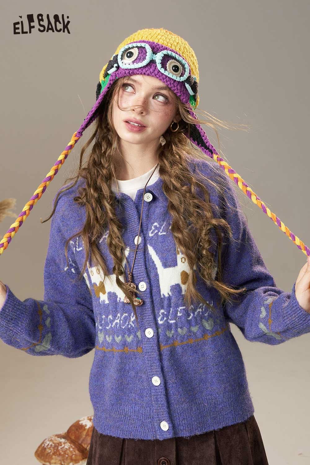Cartoon kitten knit cardigan by ELFSACK in purple with a playful design, paired with a colorful hat