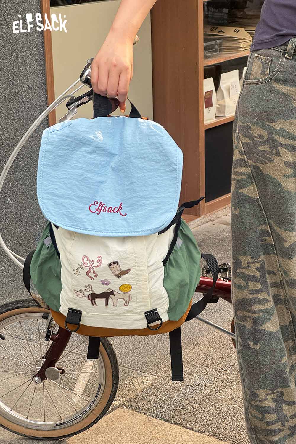 ELFSACK Cartoon Print Color‑Block Drawstring Backpack