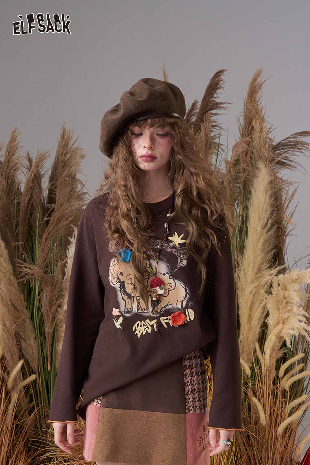 ELFSACK cartoon print long sleeve tee featuring a colorful design and relaxed fit for casual style.