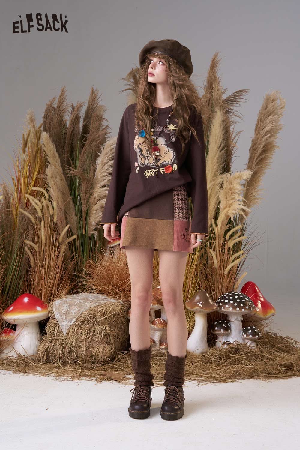 ELFSACK cartoon print long sleeve tee in brown featuring a playful design on soft fabric