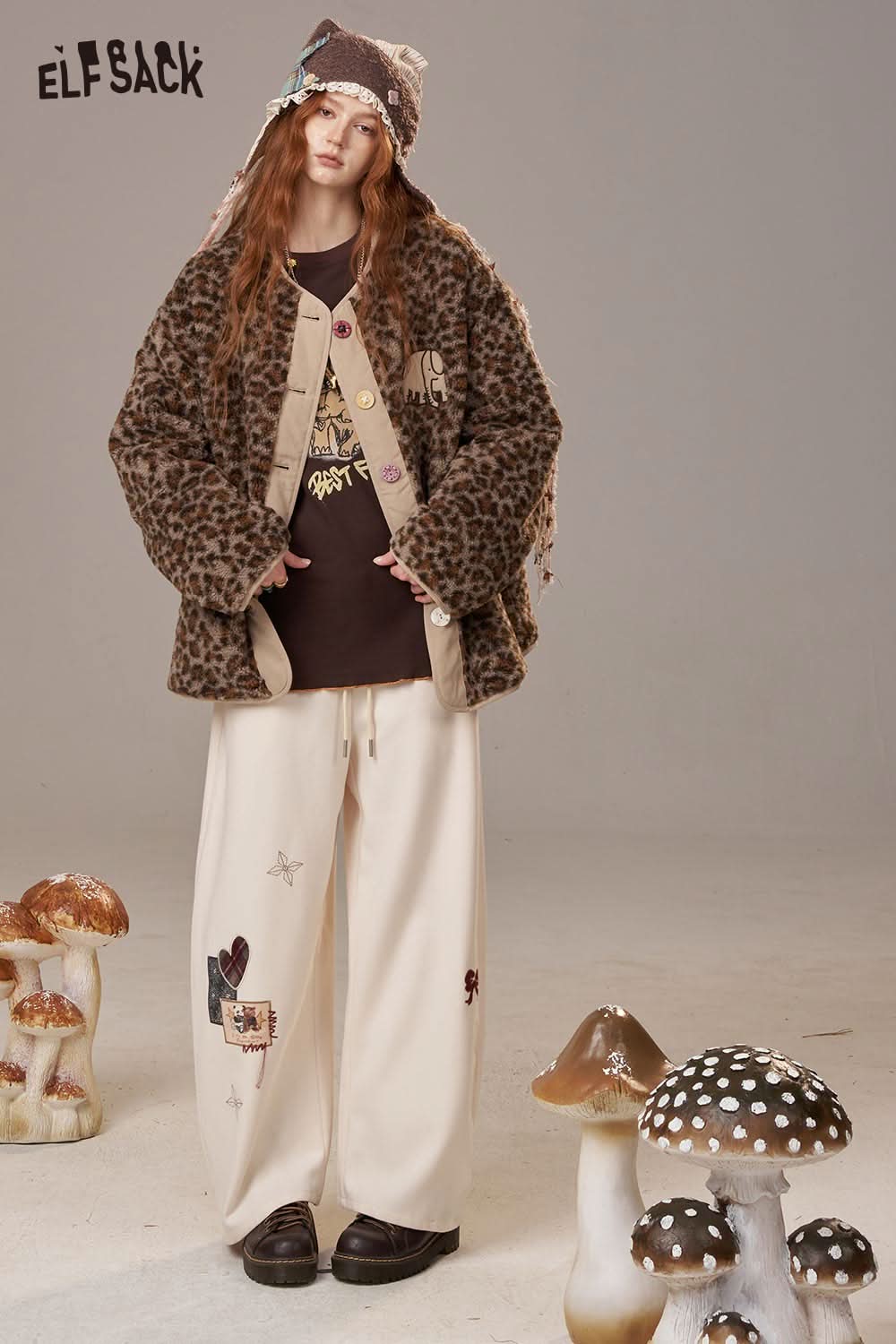 ELFSACK cartoon print long sleeve tee paired with cozy outerwear and stylish oversized pants