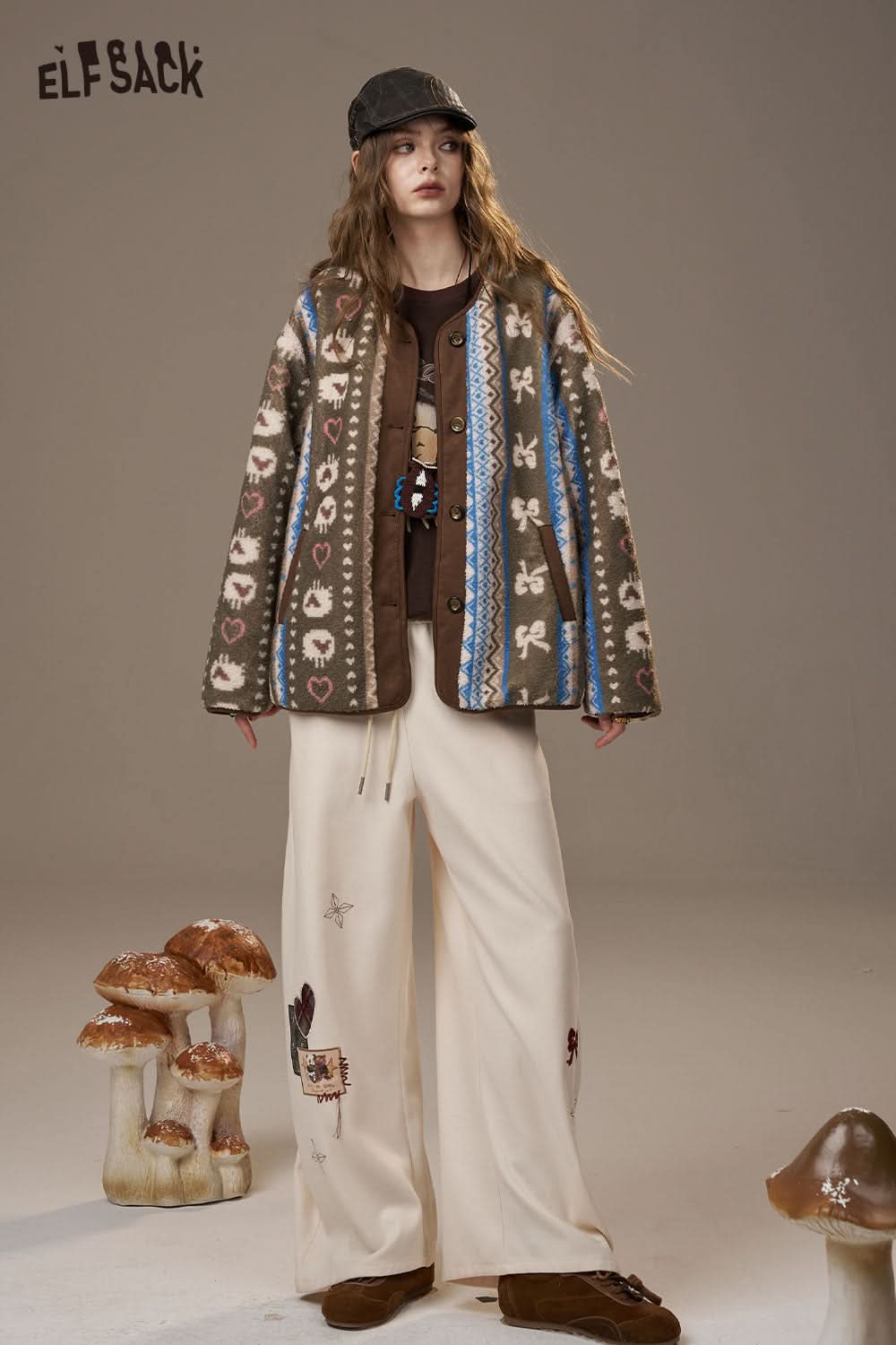 ELFSACK cartoon print long sleeve tee styled with a cozy cardigan and wide pants