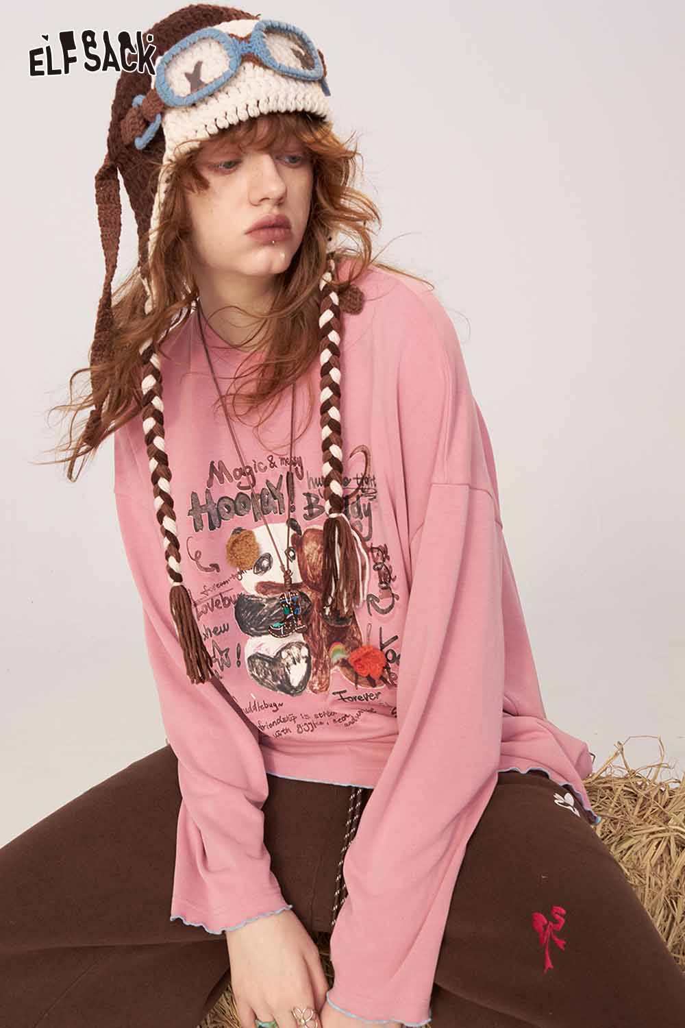 ELFSACK cartoon print long sleeve tee in pink with playful graphic design for casual wear