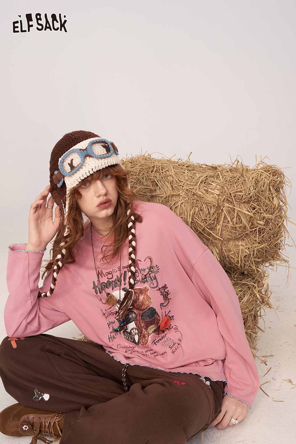 ELFSACK pink cartoon print long sleeve tee with playful design for casual style