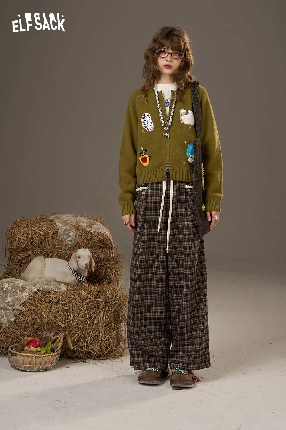 Cute ELFSACK cartoon sweater cardigan for women featuring playful patches and stylish design