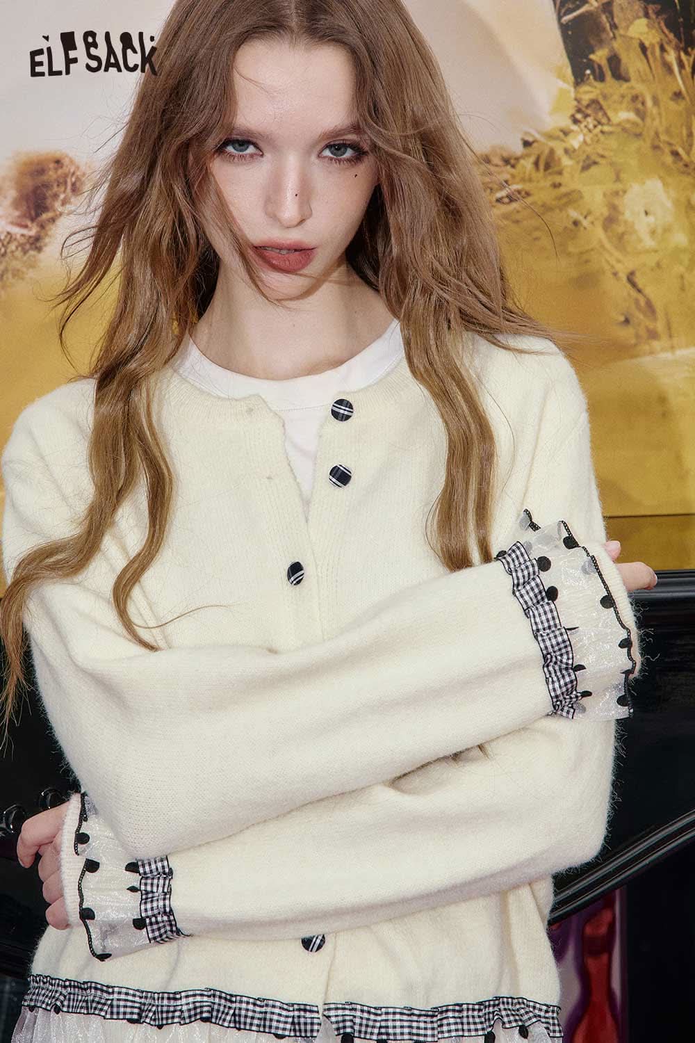 ELFSACK cashmere blend cropped cardigan in cream with black button details and ruffled sleeves