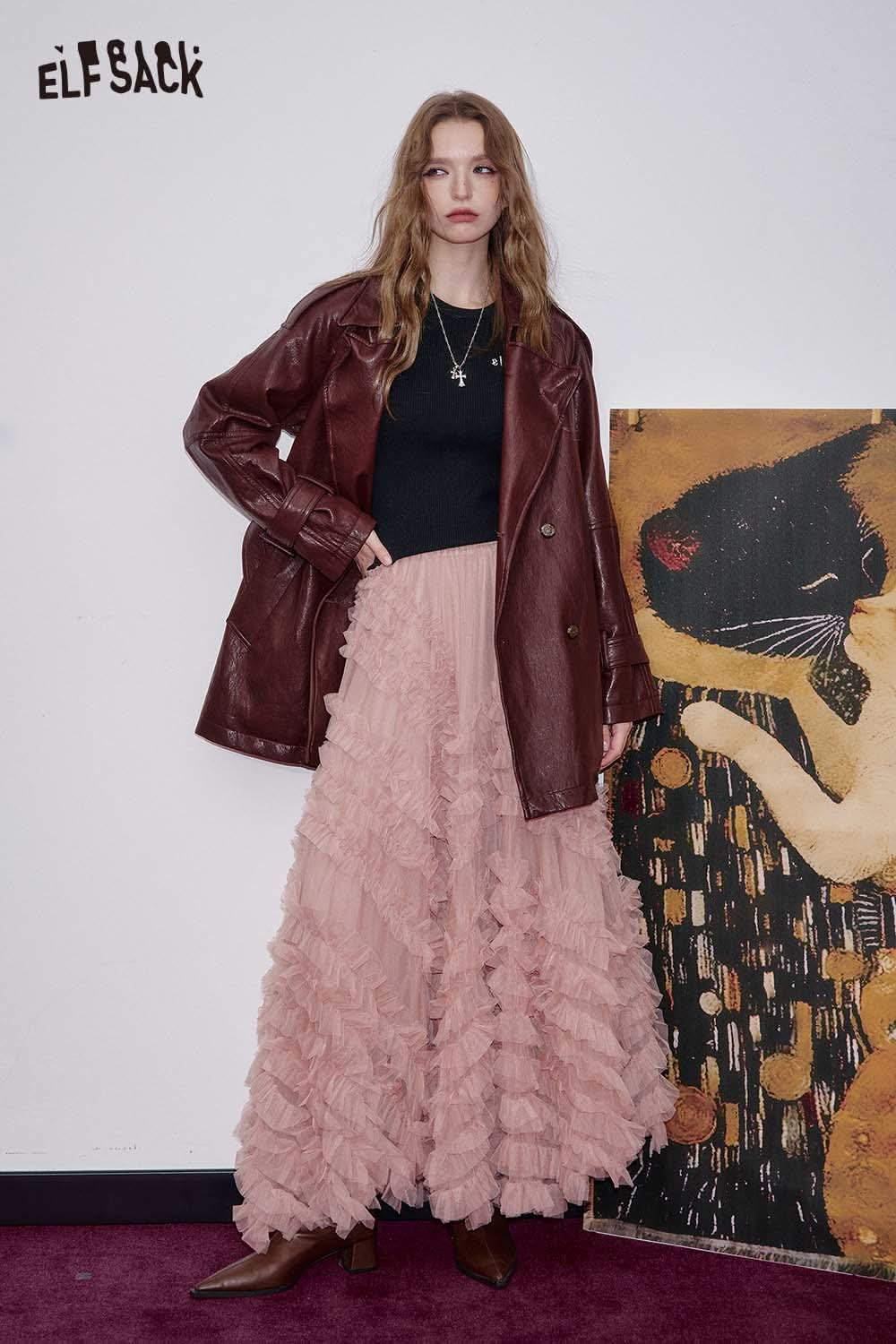 ELFSACK cashmere blend slim fit knit top paired with a ruffled skirt and oversized leather jacket