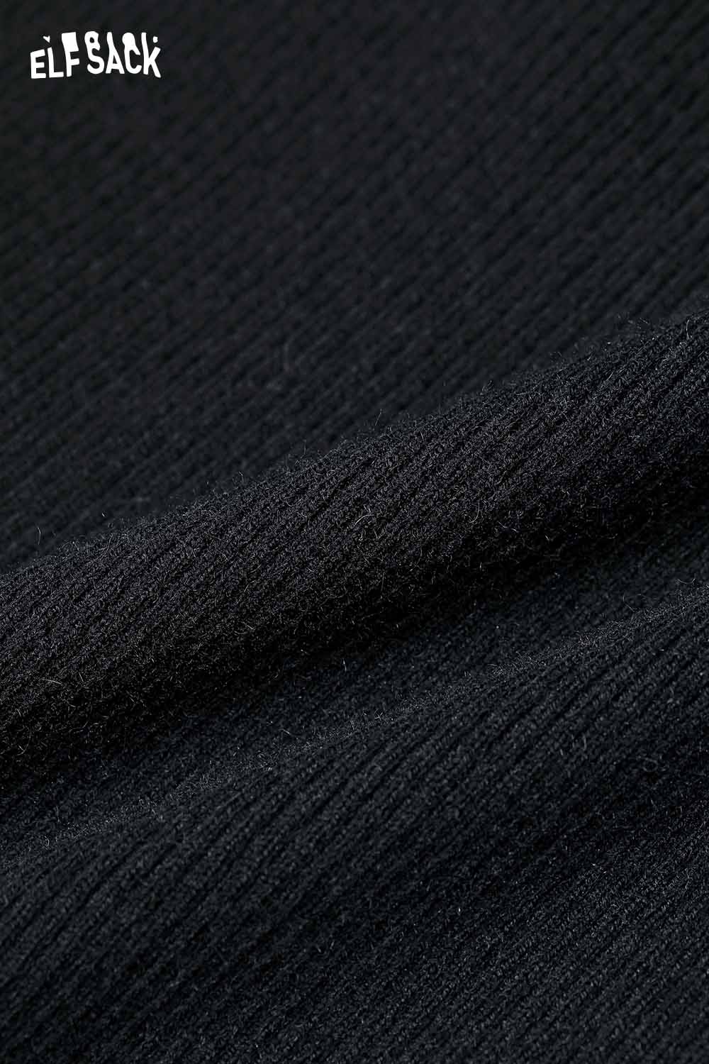 Close-up of ELFSACK cashmere blend slim fit knit top showcasing soft texture and quality fabric