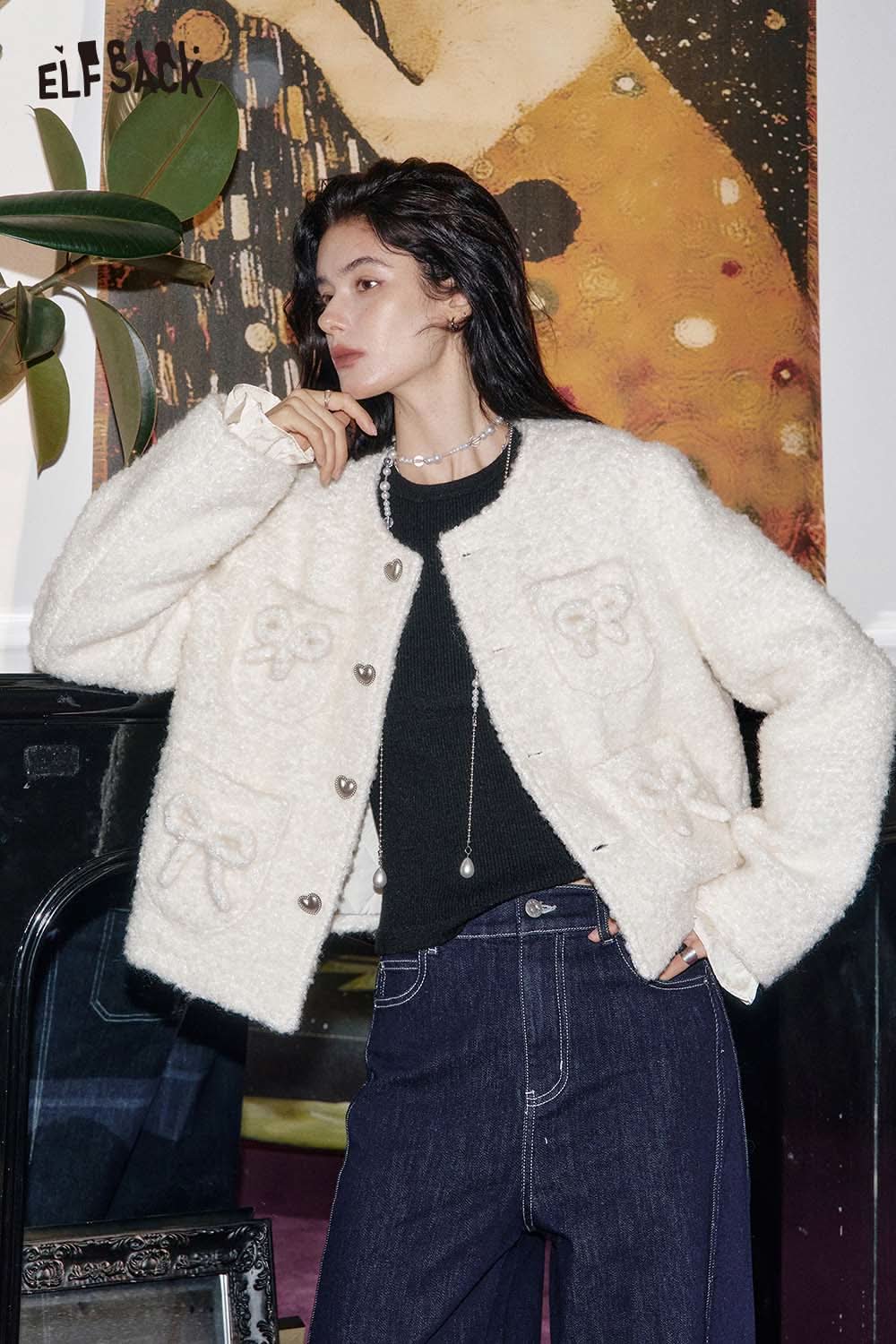 ELFSACK cashmere blend slim fit knit top styled with a white fluffy jacket and denim jeans