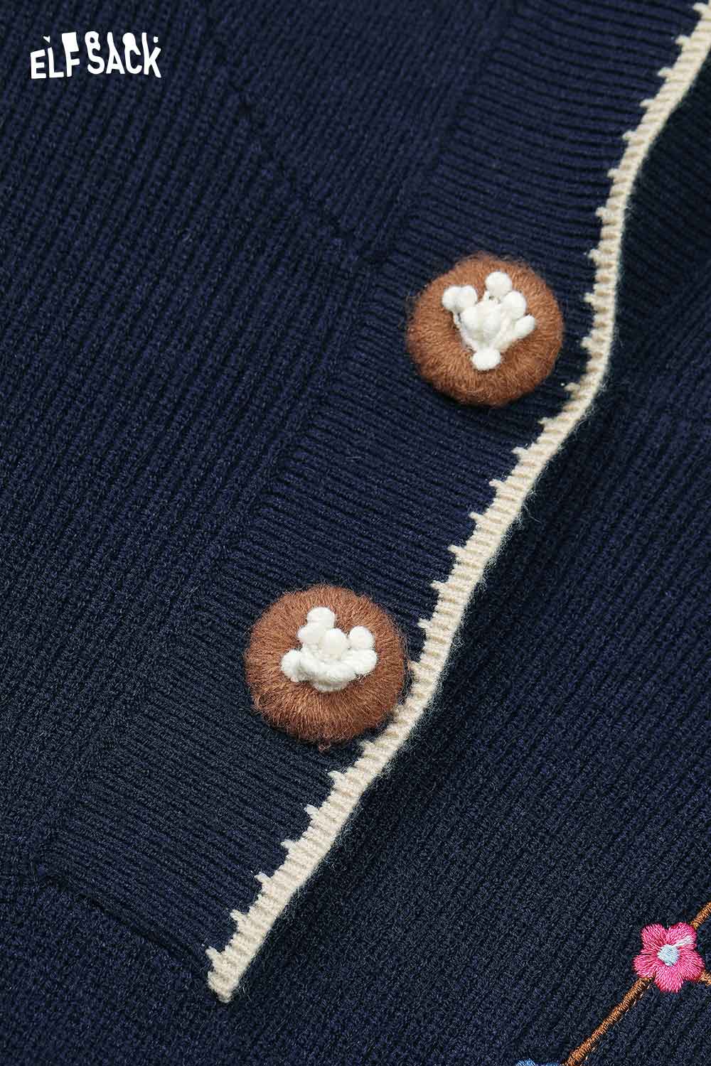 Close-up of casual embroidered hooded long dress from ELFSACK featuring unique button details