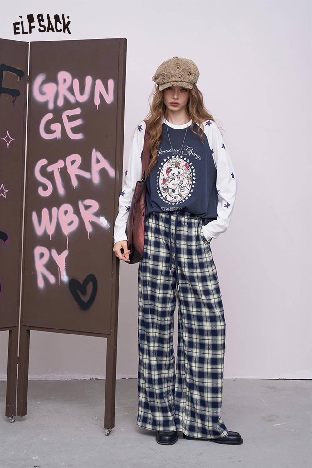 ELFSACK women's plaid wide leg pants in navy cream high waist relaxed fit modeled with graphic top and cap